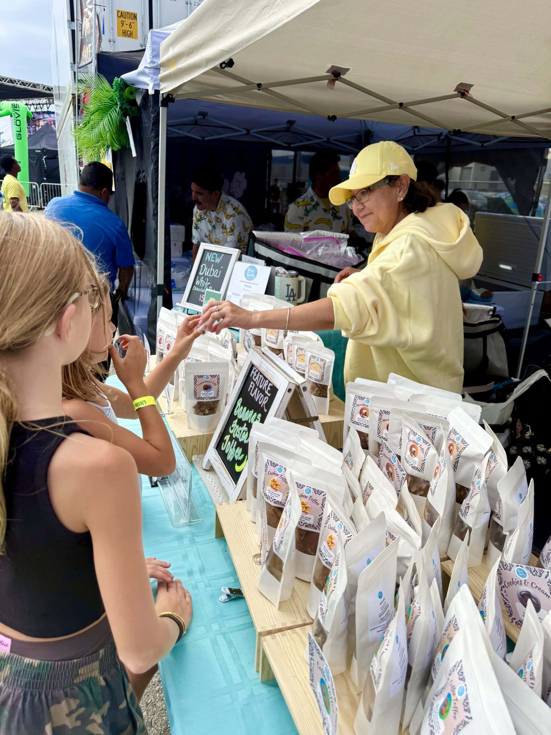 Banana Festival Vendor Booth Vendor selling banana products at the Banana Festival outdoor market.